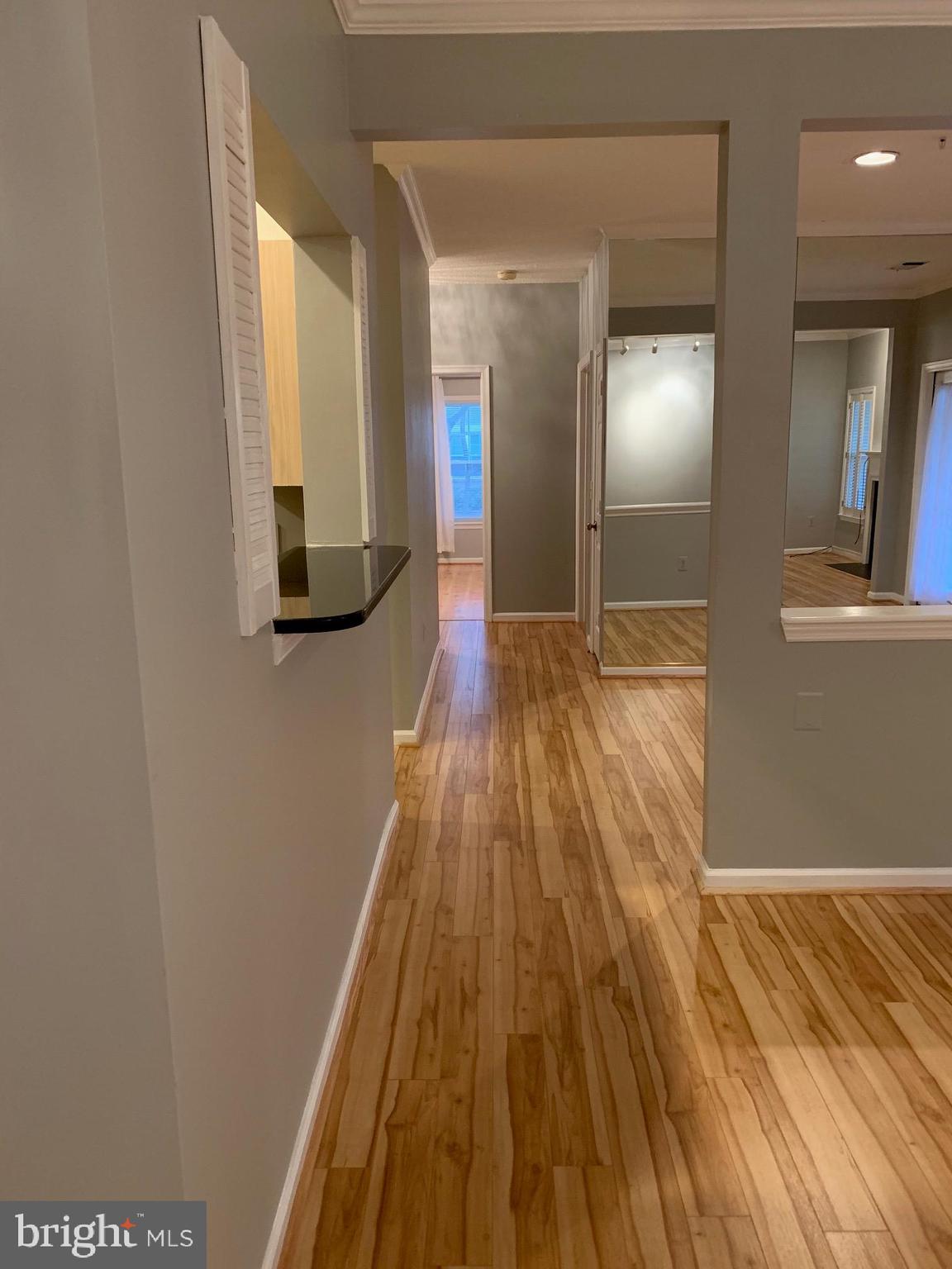 12009 Taliesin Place, Unit 12 Reston, VA 20190 - Photo 6 of 15 Light and bright hall to bedrooms