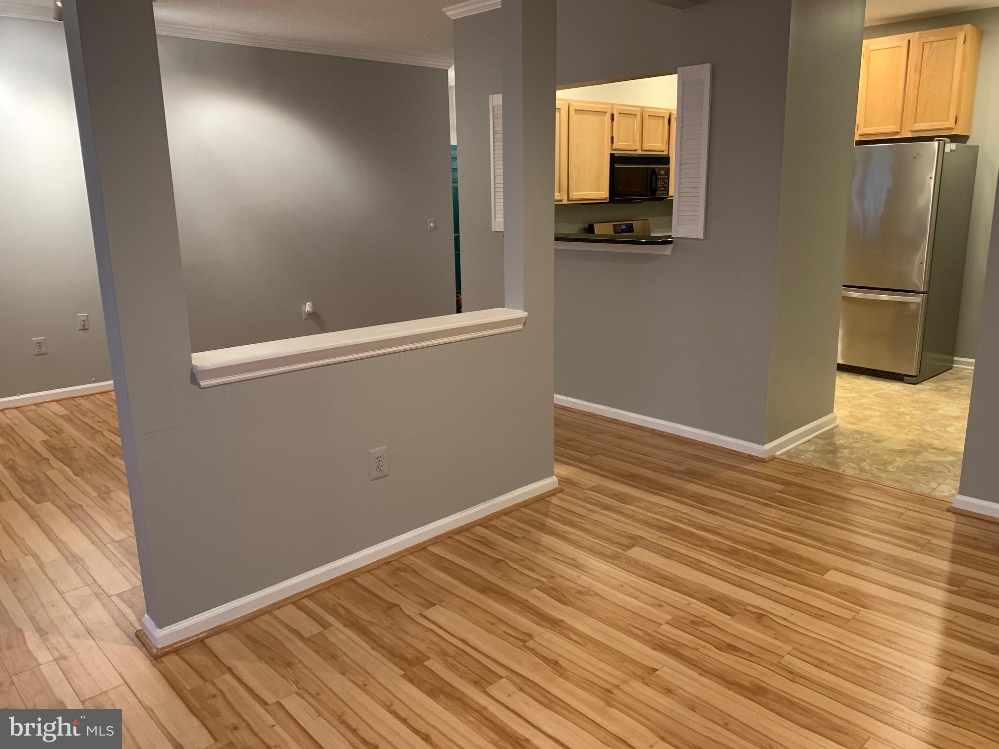 12009 Taliesin Place, Unit 12 Reston, VA 20190 - Photo 7 of 15 Separate dining and living space