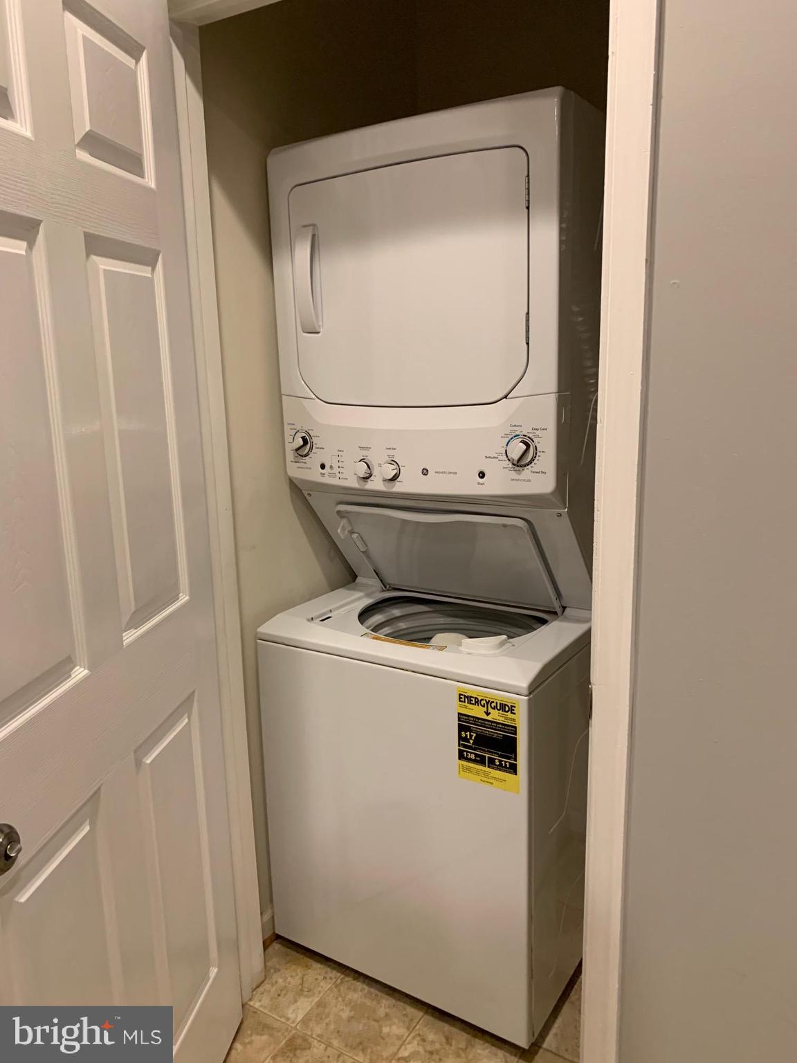 12009 Taliesin Place, Unit 12 Reston, VA 20190 - Photo 9 of 15 In-unit, stacked washer and dryer