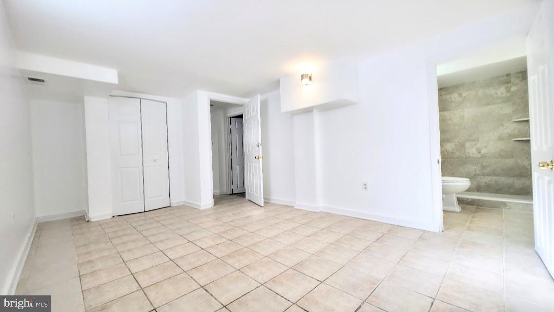 12217 Valleywood Drive Silver Spring, MD 20902 - Photo 28 of 36 a view of an empty room