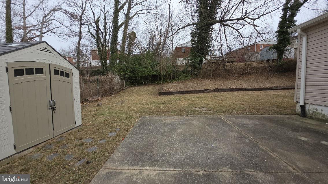 12217 Valleywood Drive Silver Spring, MD 20902 - Photo 34 of 36 a view of a back yard of the house