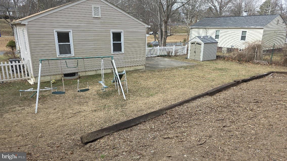 12217 Valleywood Drive Silver Spring, MD 20902 - Photo 36 of 36 a view of a house with a backyard