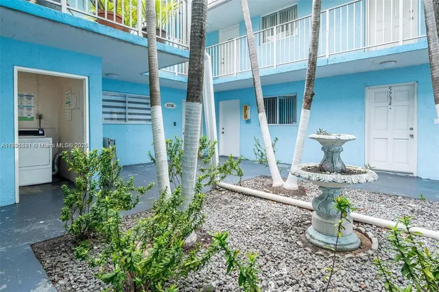 a car parked in front of a house