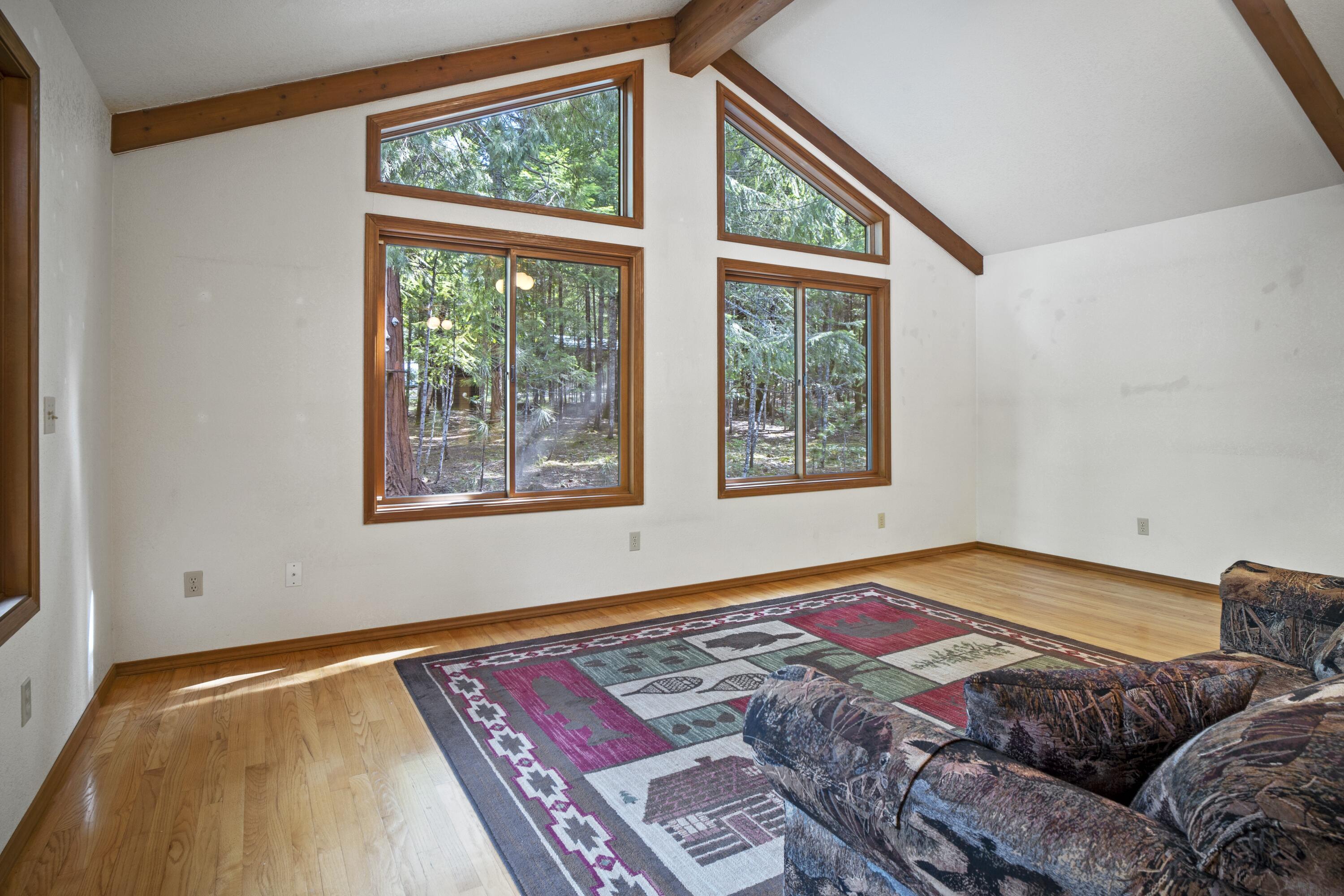 2021 Queens Branch Road Rogue River, OR 97537 - Photo 7 of 37 a bedroom with a bed and a window
