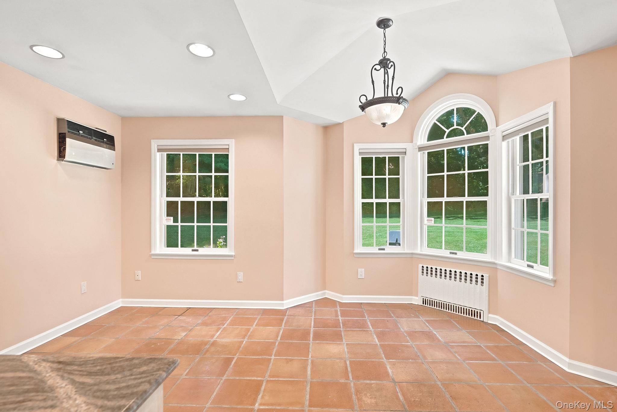 1 Sheridan Road Scarsdale, NY 10583 - Photo 14 of 40 Sitting/Dining area of Great Room with room for sofa on left wall