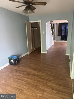 a view of a livingroom with wooden floor
