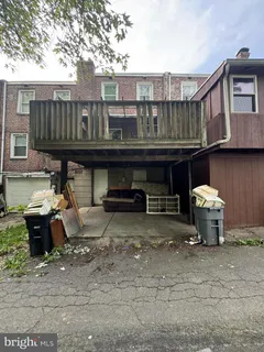 a front view of a house with patio