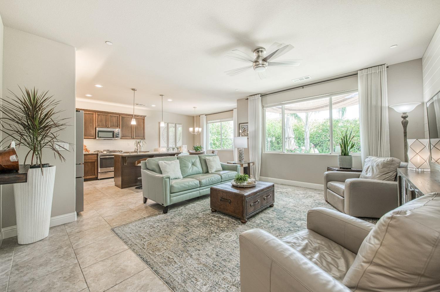 3479 Park Avenue Clovis, CA 93611 - Photo 11 of 27 a living room with furniture and a large window