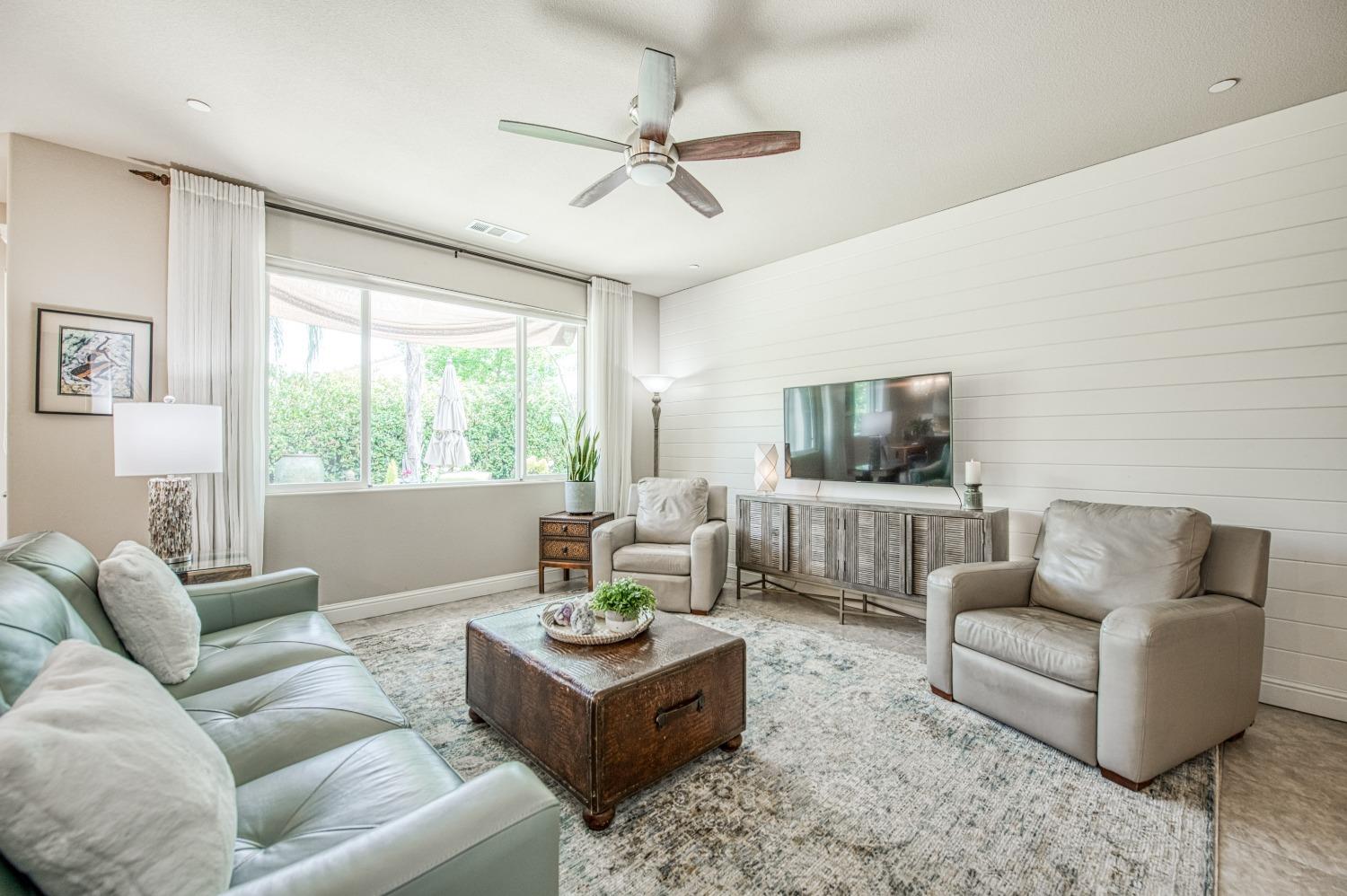 3479 Park Avenue Clovis, CA 93611 - Photo 12 of 27 a living room with furniture and a large window