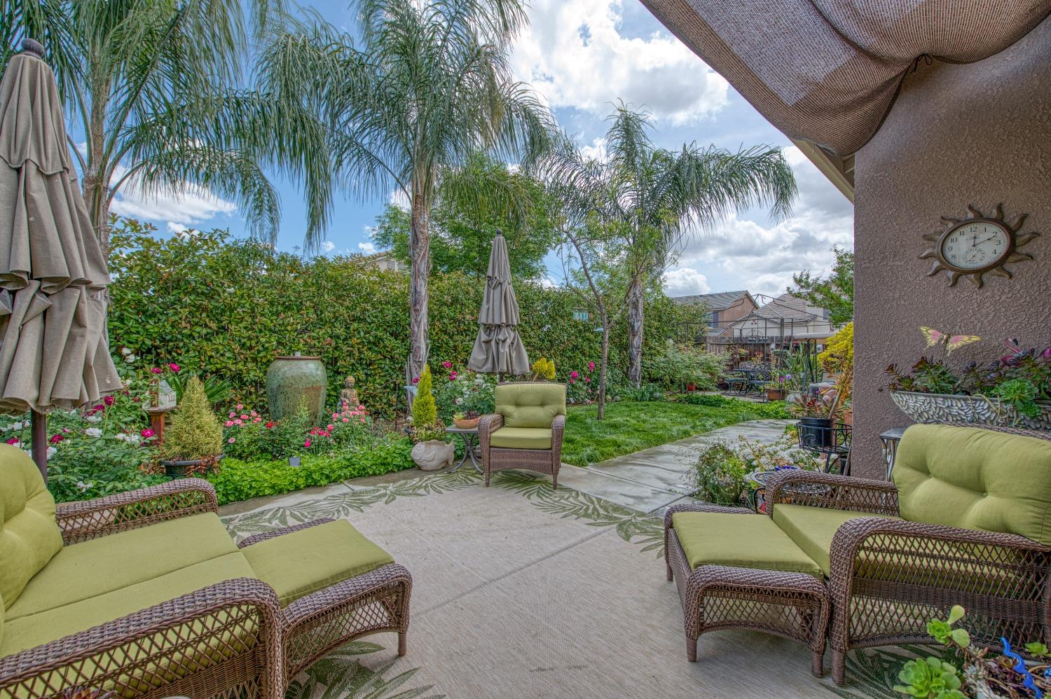 3479 Park Avenue Clovis, CA 93611 - Photo 20 of 27 a view of a patio with couches and a fire pit