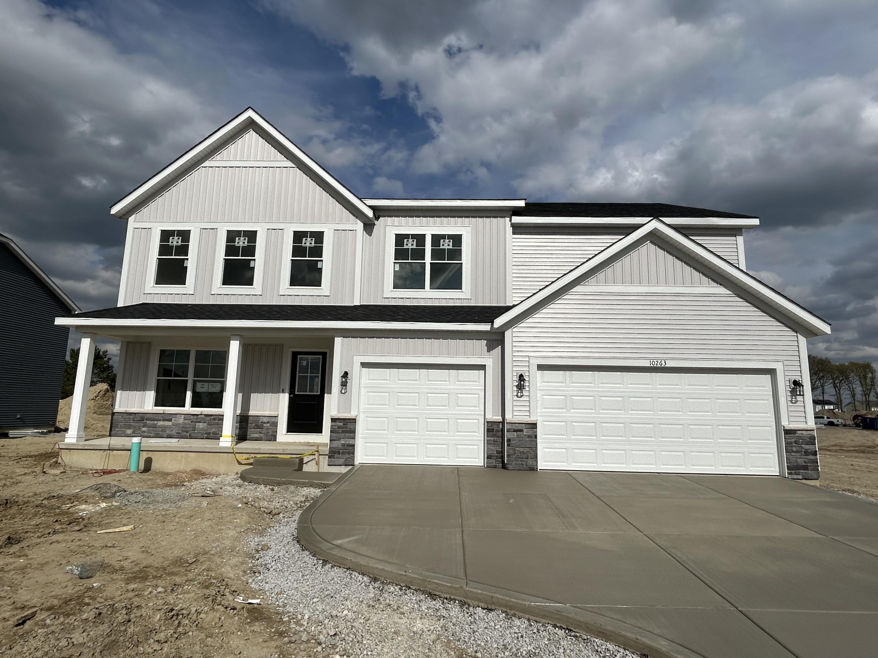 10263 Texas Street Crown Point, IN 46307 - Photo 1 of 1 a view of a white house with large windows