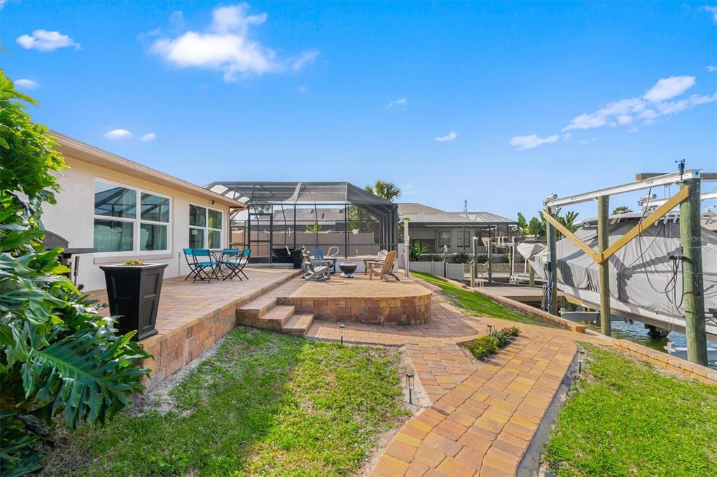5 Cheyenne Court Palm Coast, FL 32137 - Photo 32 of 61 a view of a backyard with swimming pool