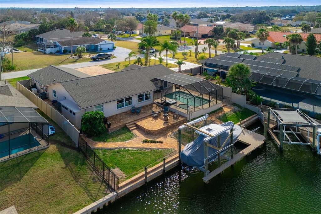 5 Cheyenne Court Palm Coast, FL 32137 - Photo 51 of 61 an aerial view of residential houses with outdoor space