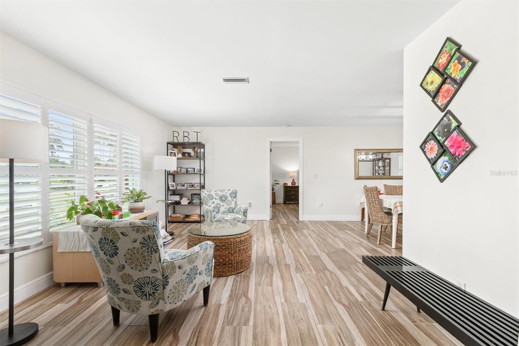 5 Cheyenne Court Palm Coast, FL 32137 - Photo 7 of 61 a dining room with furniture and wooden floor