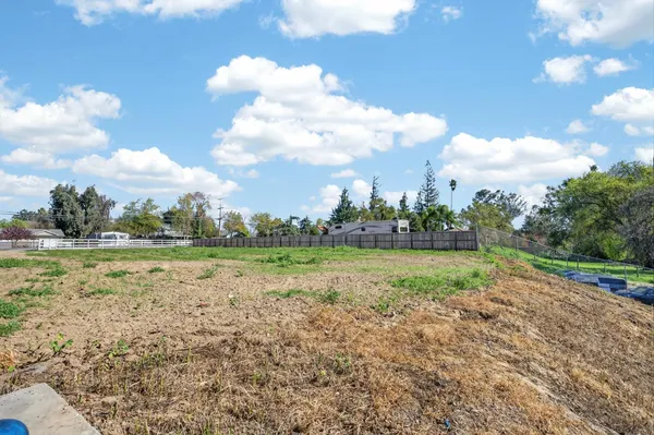 a view of a golf course with a lake