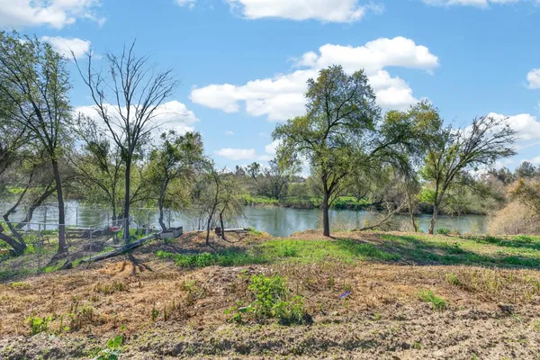 a view of a road with a yard