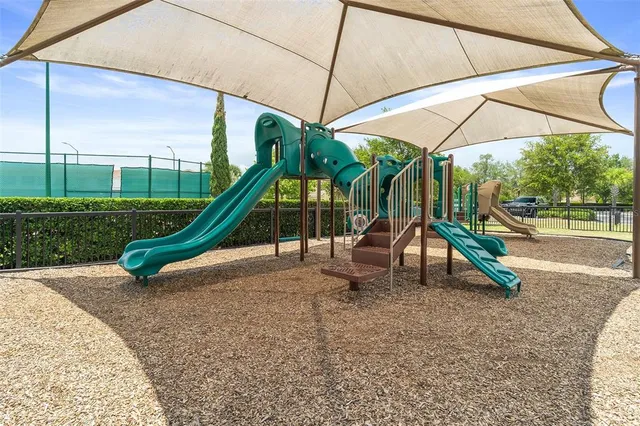 a view of a park with a slide