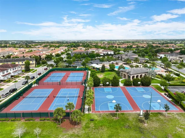 a front view of a house with yard porch and green space