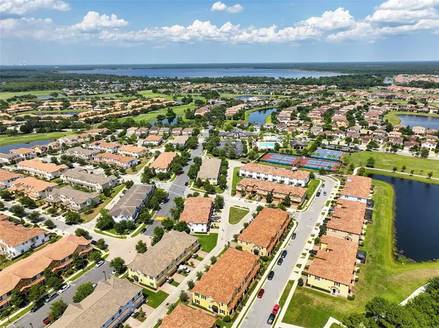 an aerial view of residential building with parking space