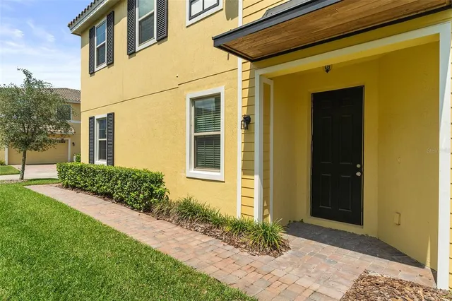 a front view of a house having yard