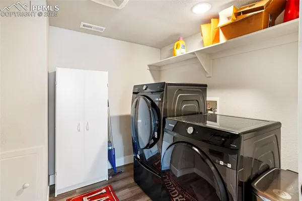 a utility room with dryer and washer