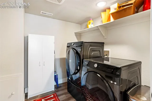 a utility room with dryer and washer