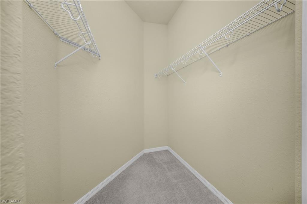 9509 Avellino Way, Unit 1821 Naples, FL 34113 - Photo 23 of 50 Primary Walk-In Closet
