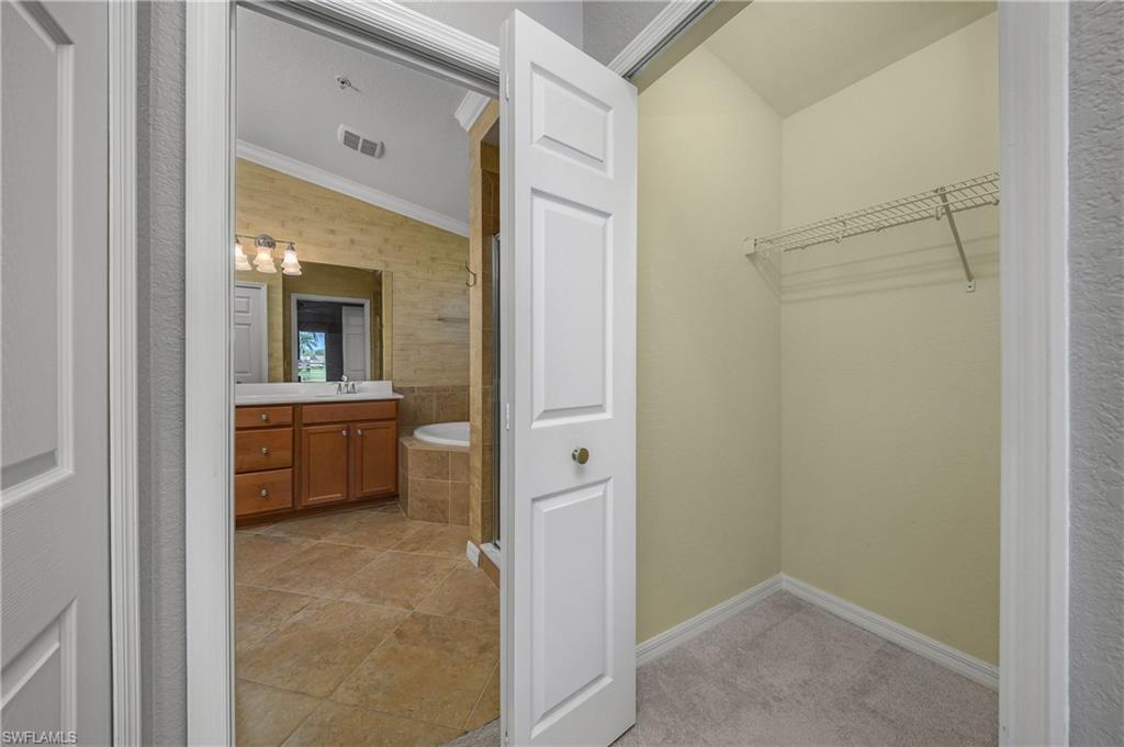 9509 Avellino Way, Unit 1821 Naples, FL 34113 - Photo 24 of 50 Primary Closet #2