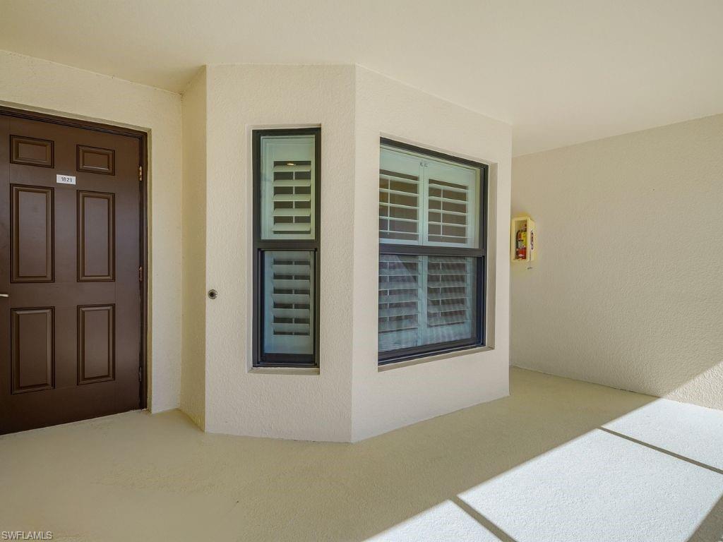 9509 Avellino Way, Unit 1821 Naples, FL 34113 - Photo 32 of 50 Front Lanai