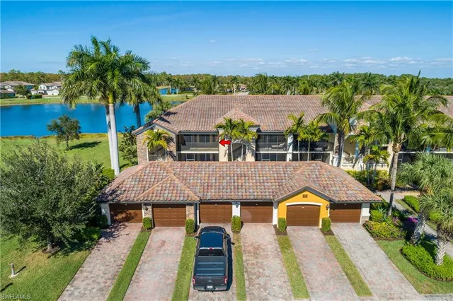an aerial view of a house with a garden