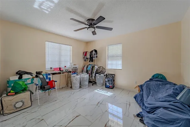 a view of a balcony with furniture