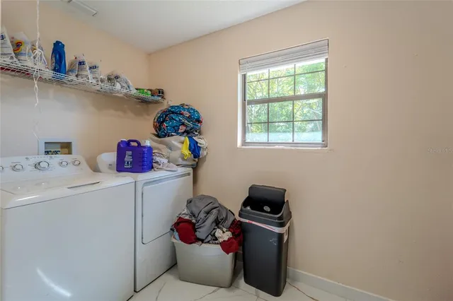 a view of a yard with an outdoor space