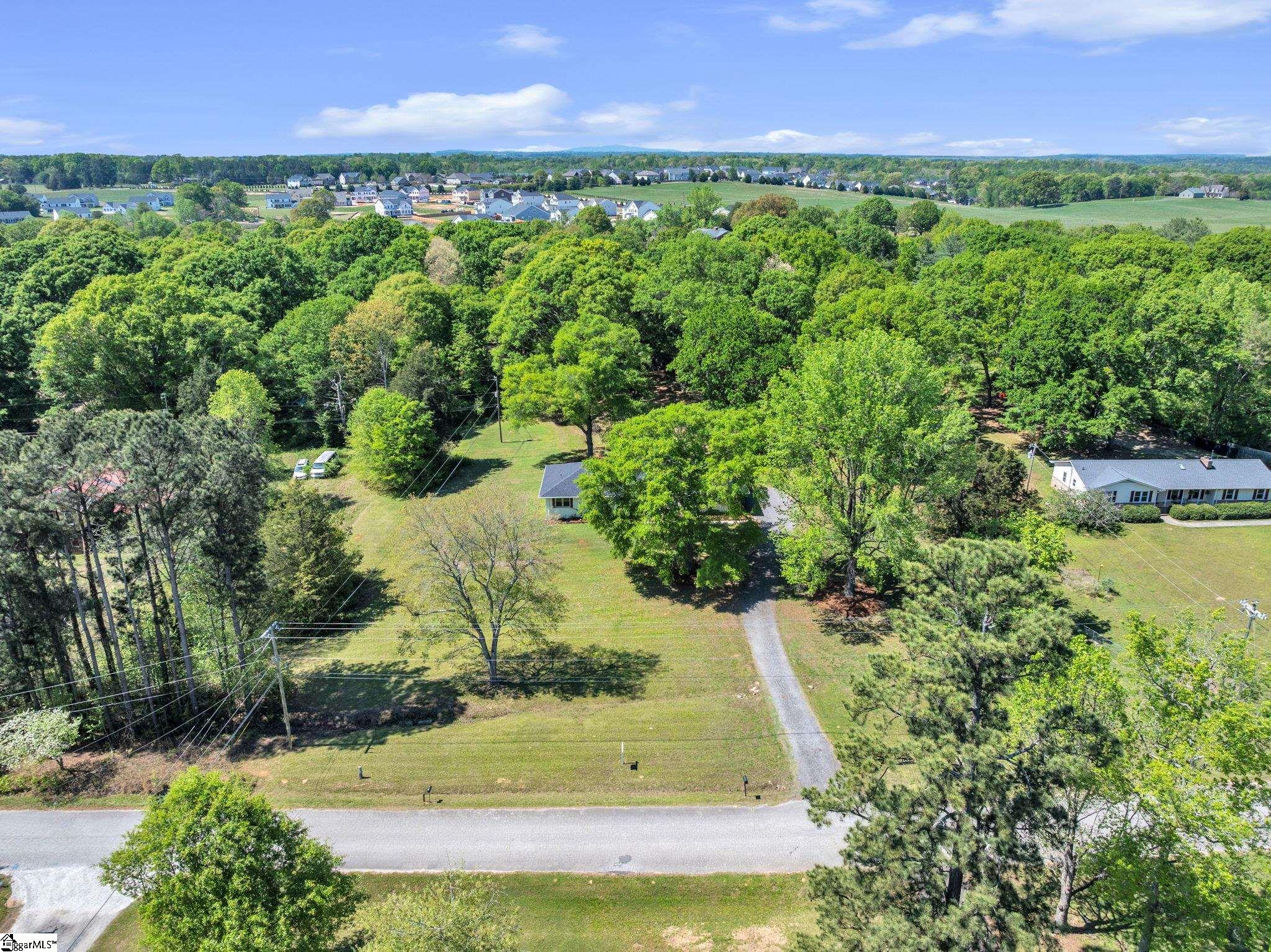 745 Canterbury Trail Fountain Inn, SC 29644 - Photo 21 of 25 Aerial view showing Canterbury Trl and driveway to home