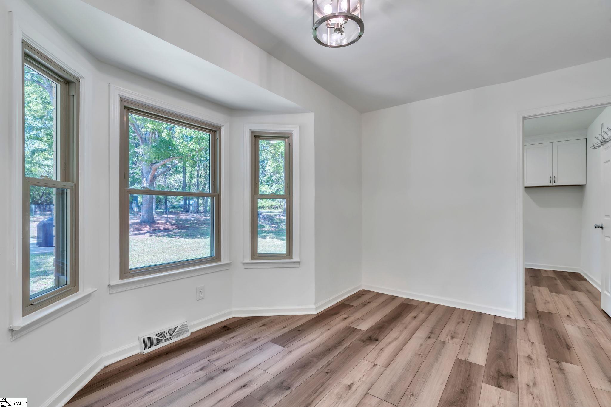745 Canterbury Trail Fountain Inn, SC 29644 - Photo 6 of 25 Lots of windows overlooking the huge back yard. Nice place to enjoy your morning coffee or tea.