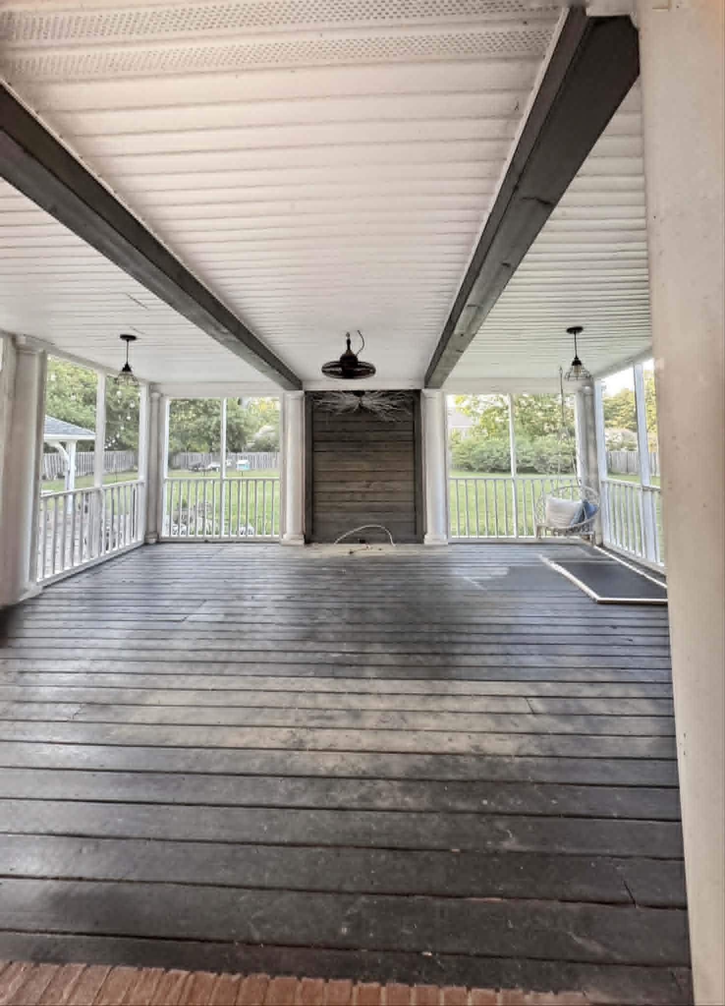 37 Crownpointe Cove Jackson, TN 38305 - Photo 34 of 39 Expansive screened porch featuring wood-finish flooring, exposed ceiling beams, and dual pendant lighting fixtures