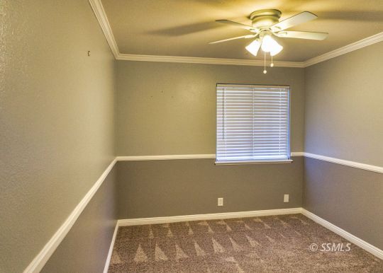 512 Amanda Street Ridgecrest, CA 93555 - Photo 23 of 44 a view of an empty room with a window