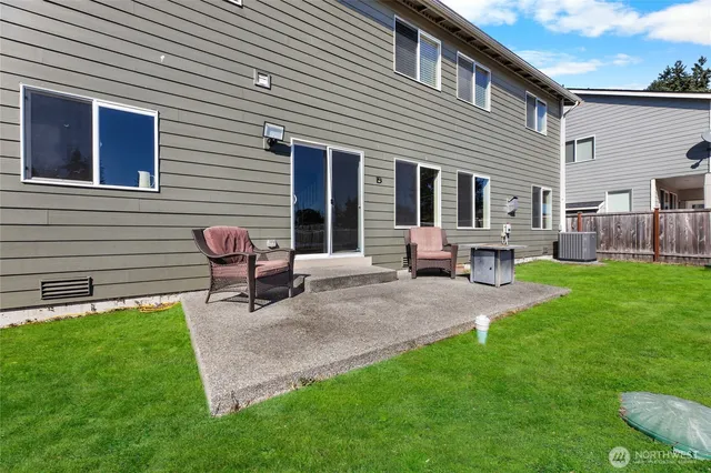 a house view with sitting space and garden