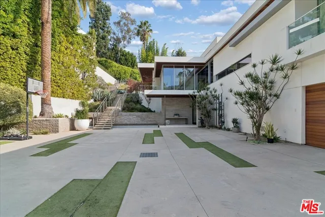 a house view with a outdoor space