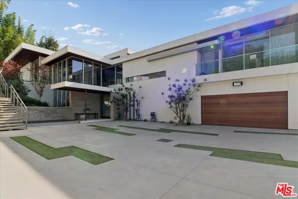 a house view with a outdoor space