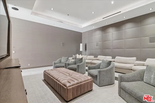 a living room with furniture and a couch