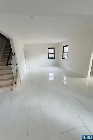 a view of a livingroom with white walls