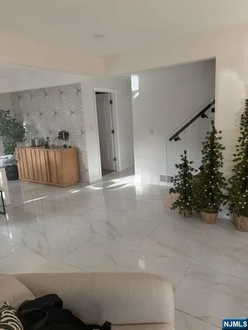 a view of an empty room with a couch