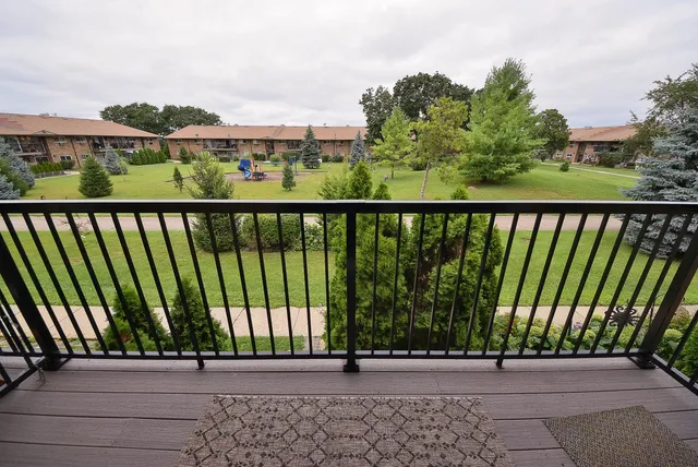 a view of a balcony with an outdoor space