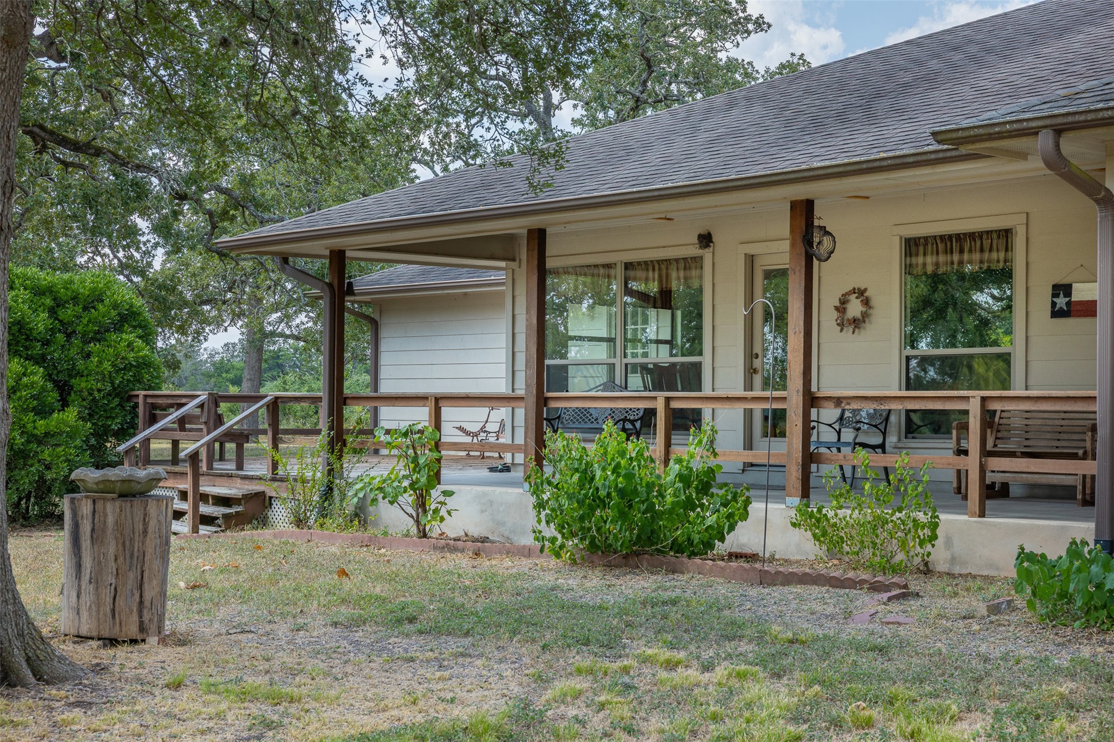 3300 Hills Road Carmine, TX 78932 - Photo 14 of 25 a front view of a house with garden