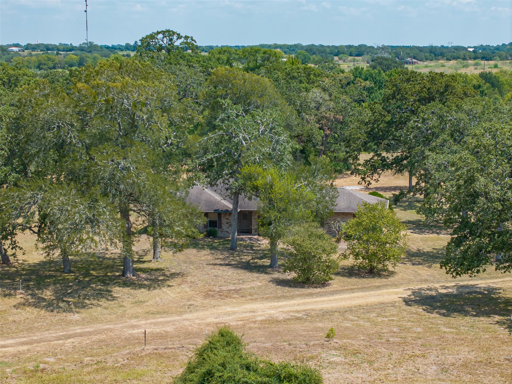 3300 Hills Road Carmine, TX 78932 - Photo 4 of 25 a view of a yard and front of house