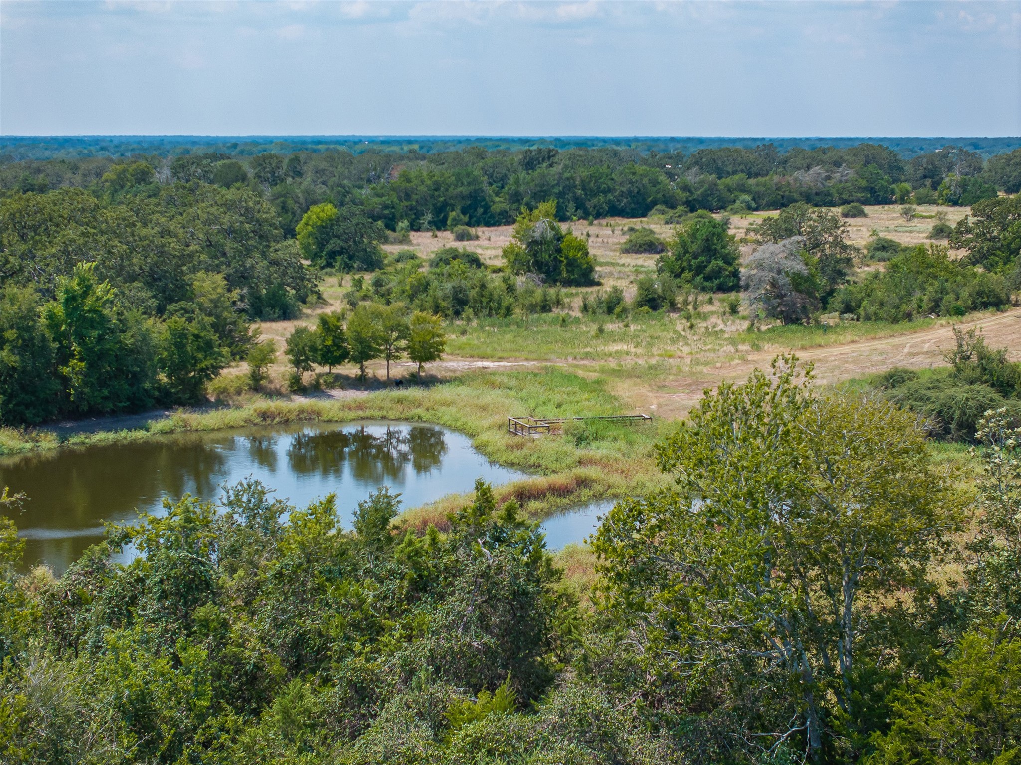 3300 Hills Road Carmine, TX 78932 - Photo 5 of 25 a view of a lake with a city view