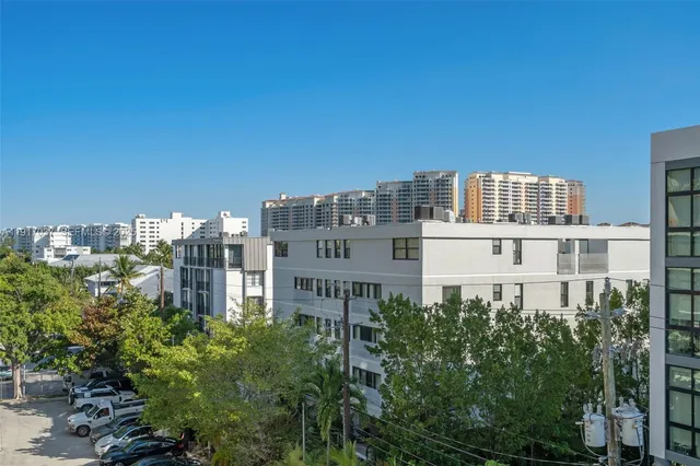 a view of a city with tall buildings