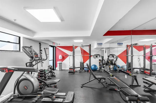 a view of gym equipment and windows