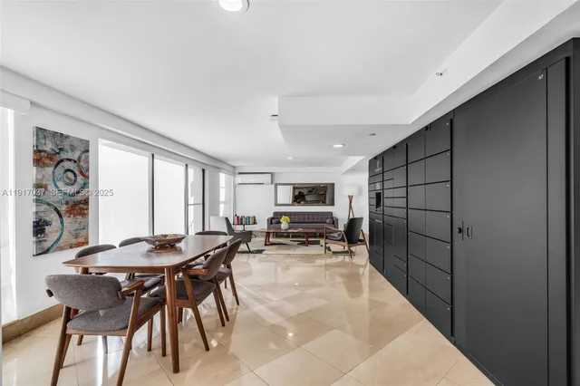 a view of a dining room with furniture and a livingroom