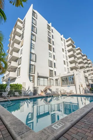 a front view of a building with balcony